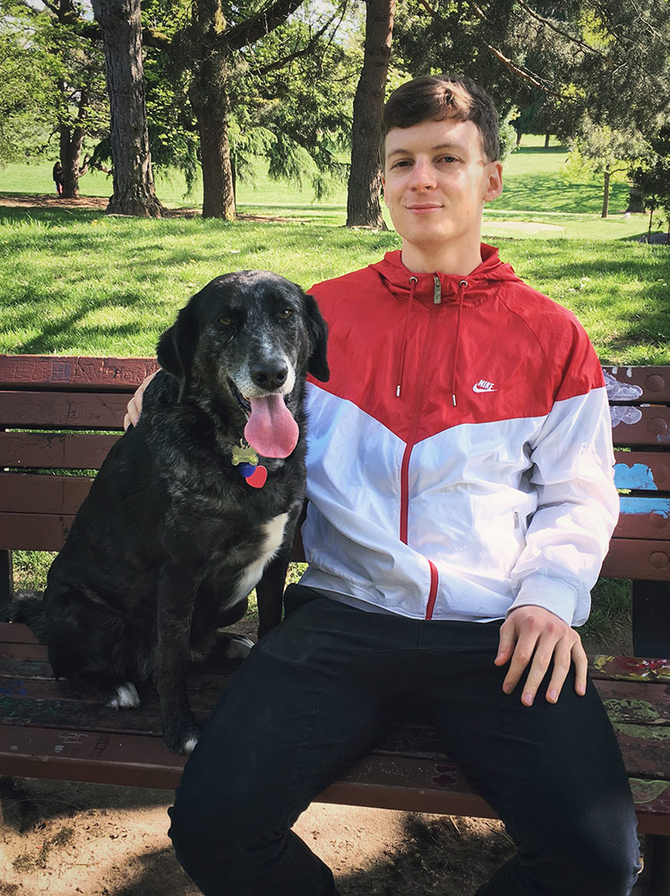 Wine Zebra's founder, Joshua Burson, and his dog, Neko.